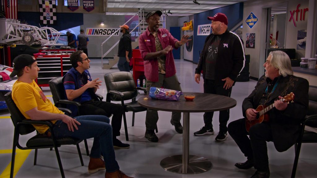 Nike Men's Sneakers of Kevin James as Kevin Gibson, Goodyear Sign and Tostitos Chips in The Crew S01E09 “Monkeys and Bears Riding Bicycles” (2021) (Image 1)