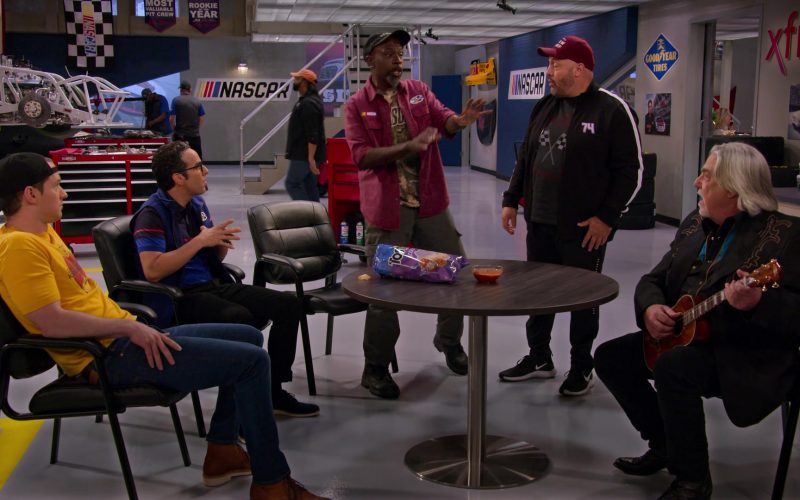 Nike Men's Sneakers of Kevin James as Kevin Gibson, Goodyear Sign and Tostitos Chips in The Crew S01E09 “Monkeys and Bears Riding Bicycles” (2021) (Image 1)