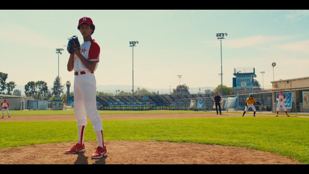Nike Red Sneakers of Jaden Michael as Young Colin Kaepernick in Colin in Black & White S01E03 “Road Trip” (2021) (Image 1)