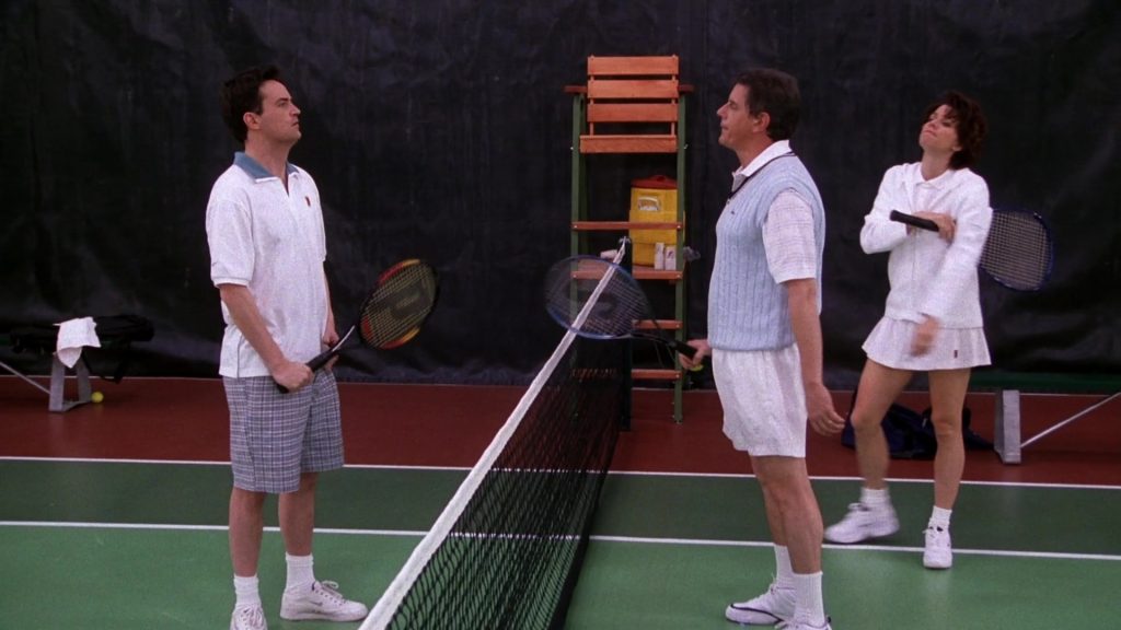 Nike Shirt, Sneakers and Prince Racket Used by Matthew Perry as Chandler Bing in Friends Season 5 Episode 12 “The One with Chandler’s Work Laugh” (1999) (Image 1)