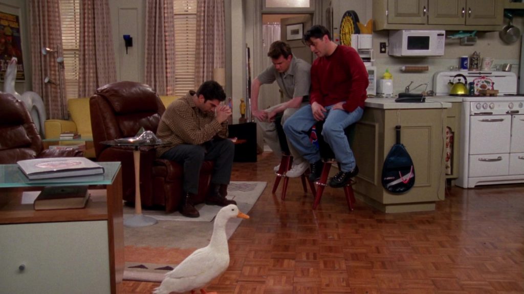 Nike Shoes Worn by Matthew Perry (Chandler Bing) and HEAD Squash Racket in Friends Season 4 Episode 23 “The One With Ross’ Wedding” (1998) (Image 1)