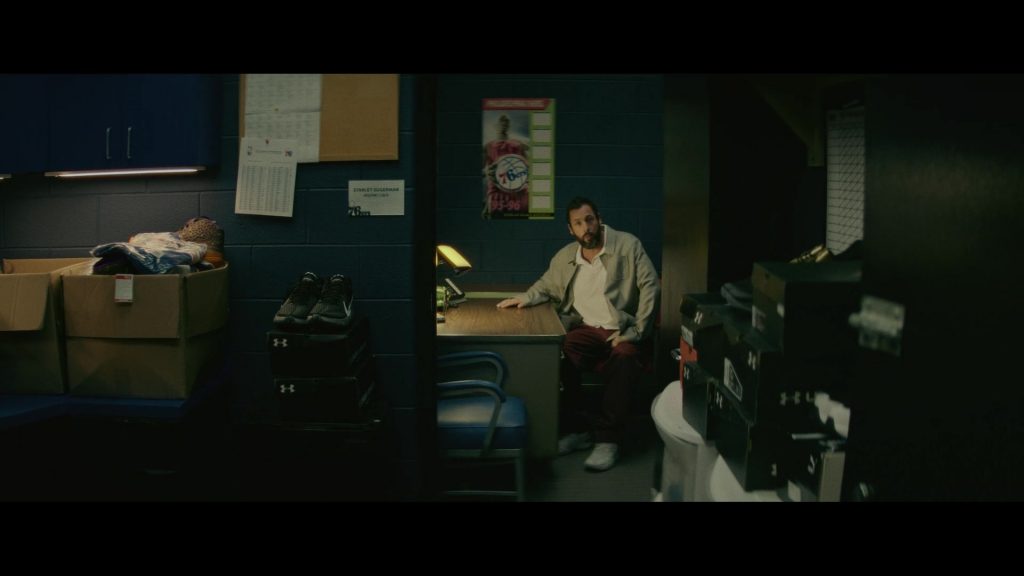 Nike Shoes and Under Armour Boxes in Hustle (2022) (Image 1)