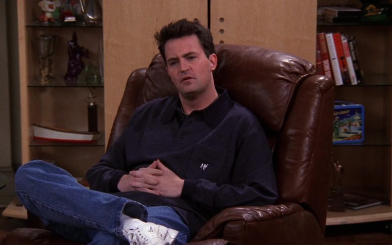 Nike Sneakers and Big Dogs Long Sleeve Shirt Worn by Matthew Perry (Chandler Bing) in Friends Season 5 Episode 12 “The One with Chandler’s Work Laugh” (1999) (Image 1)