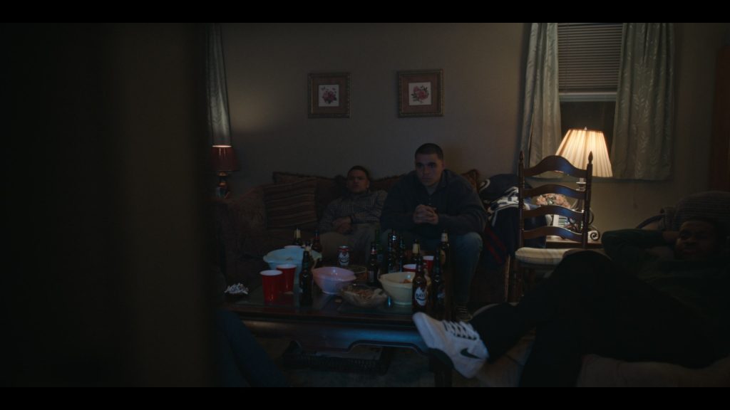 Nike Sneakers and Rolling Rock Beer Bottle in American Sports Story S01E04 “Birthday Money” (2024) (Image 1)