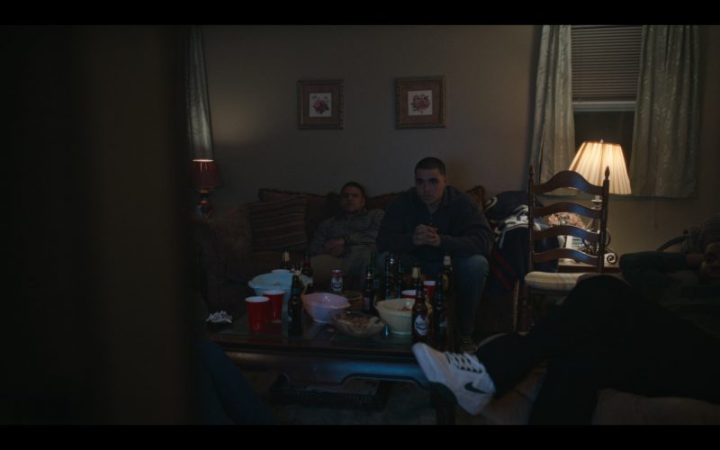 Nike Sneakers and Rolling Rock Beer Bottle in American Sports Story S01E04 “Birthday Money” (2024) (Image 1)