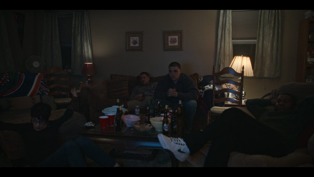 Nike Sneakers and Rolling Rock Beer Bottle in American Sports Story S01E04 “Birthday Money” (2024) (Image 2)