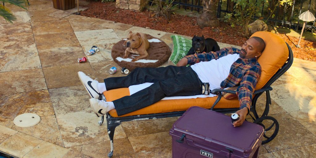 Nike Sneakers and Yeti Cooler in The Underdoggs (2024) (Image 1)