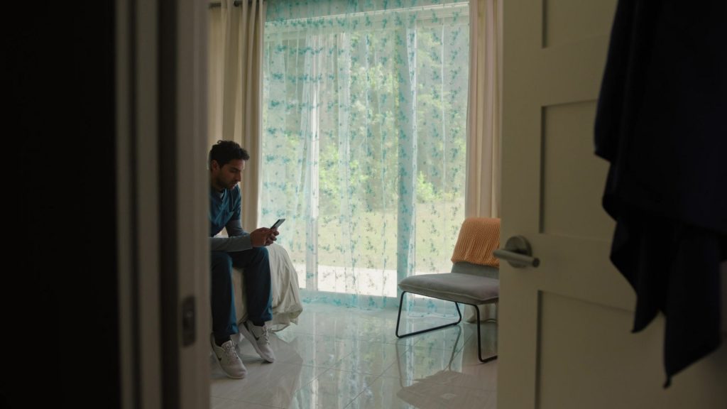 Nike Sneakers in A Nice Indian Boy (2024) (Image 1)
