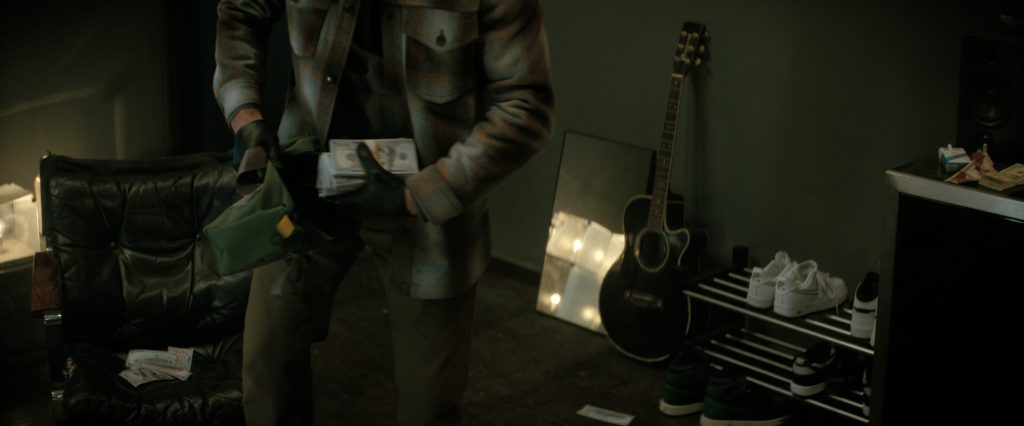 Nike Sneakers in A Working Man (2025) (Image 1)