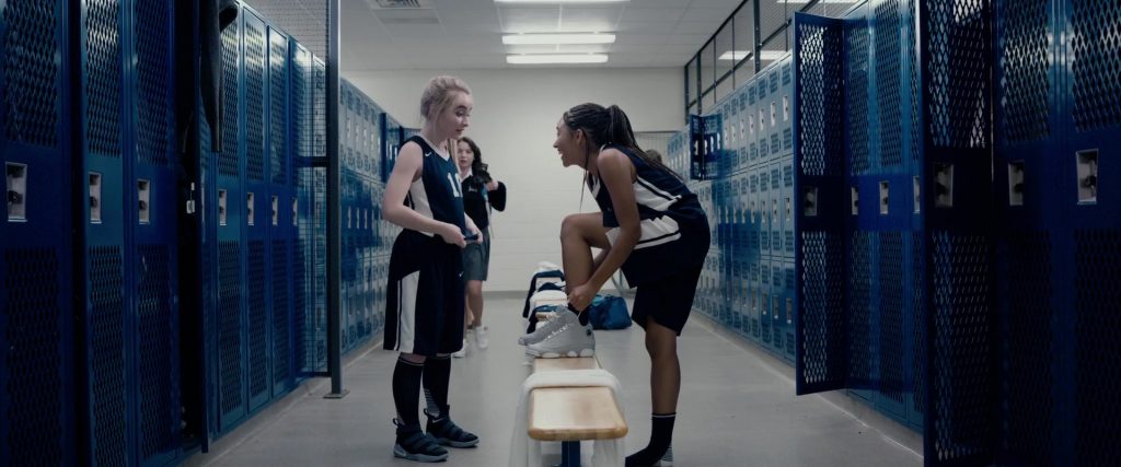 Nike Sports T-Shirt, Shorts and Shoes Worn by Amandla Stenberg and Sabrina Carpenter in The Hate U Give (2018) (Image 1)