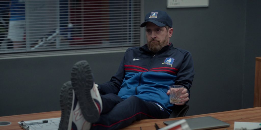 Nike Tracksuit and New Balance Sneakers Worn by Brendan Hunt in Ted Lasso S03E09 “La Locker Room Aux Folles” (2023) (Image 1)