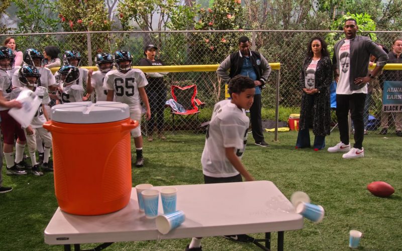Nike White Sneakers With Red Logo Worn by Anthony Alabi in Family Reunion – Season 1 Episode 8, “Remember Macho Mazzi” (2019) (Image 1)