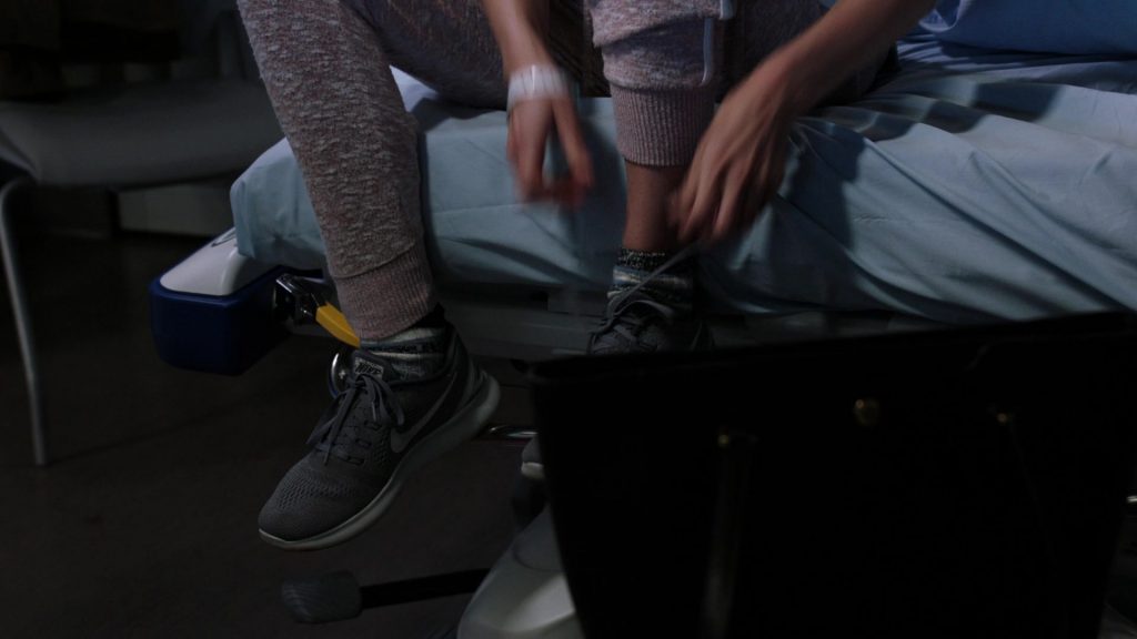 Nike Women's Free Run Flyknit Sneakers in Chicago Med S06E01 “When Did We Begin to Change” (2020) (Image 1)