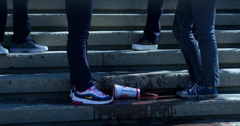 Nike Women's Sneakers and Jamba Juice Cup in Little America Season 1 Episode 2 “The Jaguar” (2020) (Image 1)