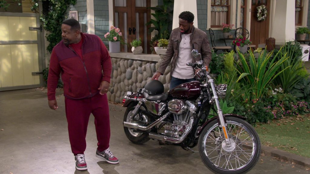 Nike Zoom Air Distressed Grey-Red Sneakers of Cedric the Entertainer as Calvin Butler in The Neighborhood S03E07 “Welcome to the Motorcycle” (2021) (Image 1)