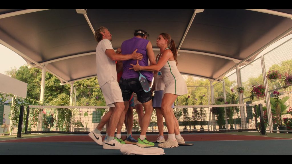 Nike and ON Shoes in Mother of the Bride (2024) (Image 1)