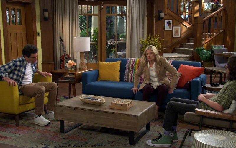 ON and Converse Shoes in The Neighborhood S08E14 “Welcome to the Things We Do for Love” (2026) (Image 1)