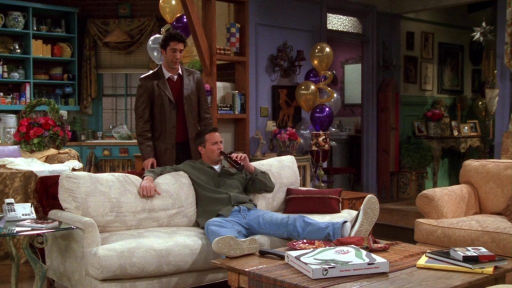 Pizza Hut and Puma Sneakers Worn by Matthew Perry (Chandler Bing) in Friends Season 9 Episode 12 “The One With Phoebe's Rats” (2003) (Image 1)