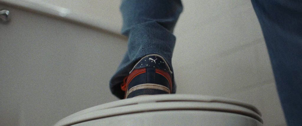 Puma (Scene 2) Shoes in She Rides Shotgun (2025) (Image 1)