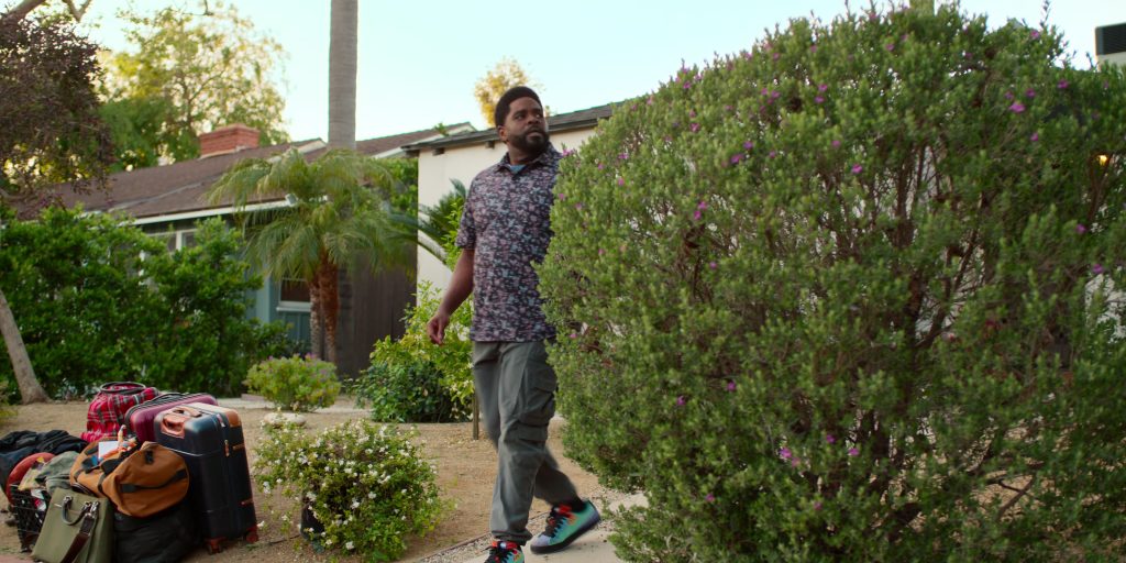 Puma (Scene 3) Suede ‘Día De Los Muertos' sneakers in Loot S03E08 “Mr. Maro Gold” (2025) (Image 1)