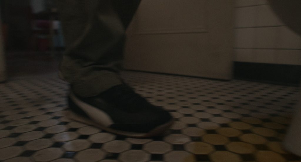 Puma Sneakers (Scene 2) in Caught Stealing (2025) (Image 7)