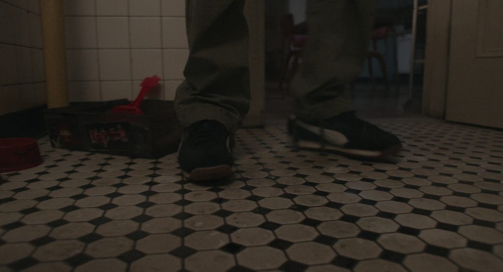 Puma Sneakers (Scene 2) in Caught Stealing (2025) (Image 8)
