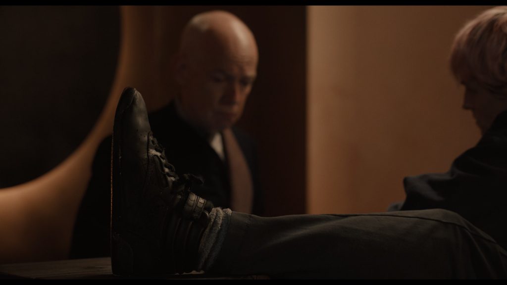 Reebok Black Sneakers Worn by Emma Corrin as Darby Hart in A Murder at the End of the World S01E02 “Chapter 2 - The Silver Doe” (2023) (Image 1)