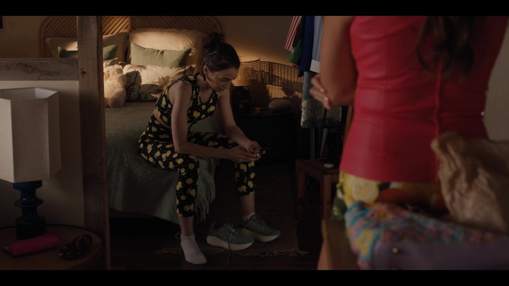 Salomon Aero Glide running shoes in Emily in Paris S05E06 “The One Where Emily Goes to the Embassy” (2025) (Image 1)