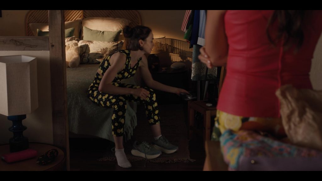 Salomon Aero Glide running shoes in Emily in Paris S05E06 “The One Where Emily Goes to the Embassy” (2025) (Image 2)