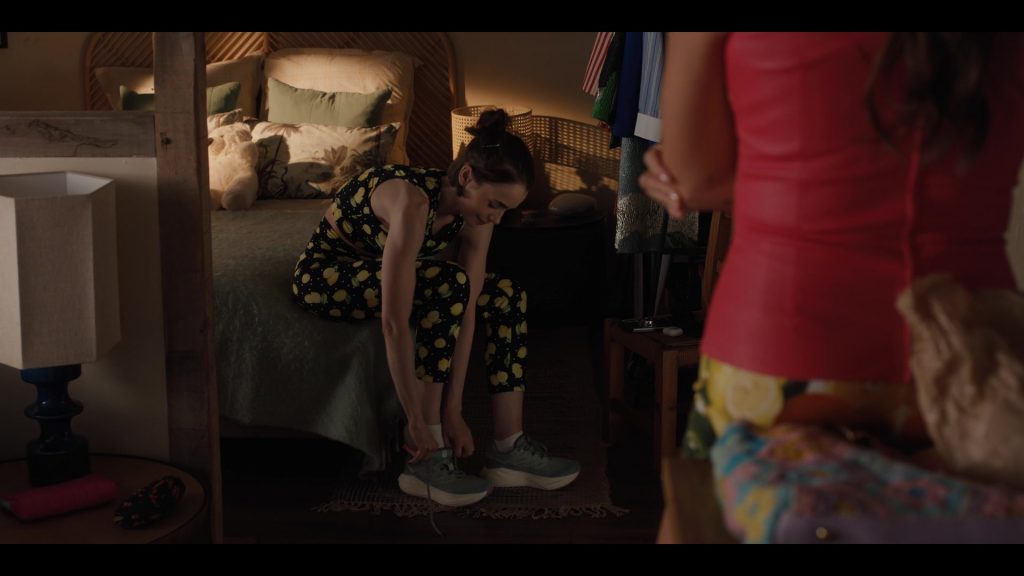 Salomon Aero Glide running shoes in Emily in Paris S05E06 “The One Where Emily Goes to the Embassy” (2025) (Image 4)