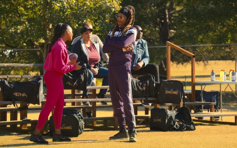 Sergio Tacchini Tracksuit and Nike Shoes Worn by Snoop Dogg as Jaycen Jennings & Tika Sumpter as Cherise, Spalding Bags, Gatorade Bottles in The Underdoggs (2024) (Image 1)