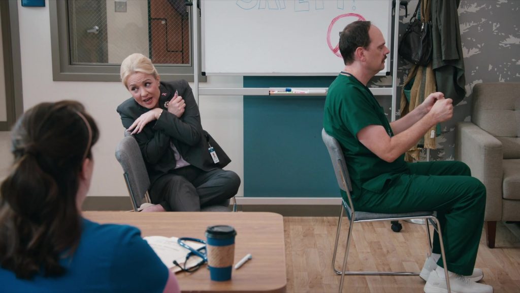 Skechers Sneakers in St. Denis Medical S02E02 “Mama Bear Activated” (2025) (Image 2)