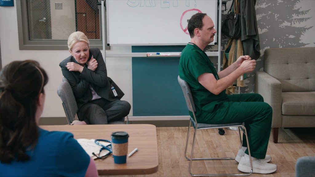 Skechers Sneakers in St. Denis Medical S02E02 “Mama Bear Activated” (2025) (Image 4)