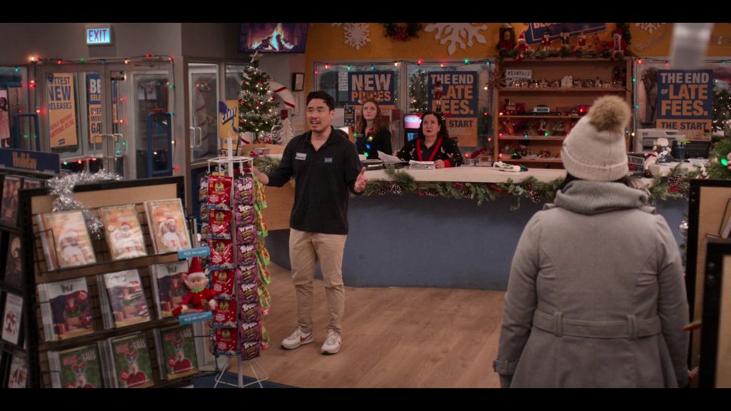 Sun-Maid Yogurt Covered Raisins, Trolli Candies and Nike Sneakers Worn by Randall Park as Timmy Yoon in Blockbuster S01E10 “Sht Storm” (2022) (Image 1)