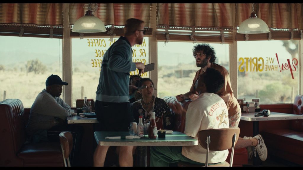 Tapatio Hot Sauces, Heinz Ketchup, Apple iPhone and New Balance Shoes in Dave S03E06 “#RIPLilDicky” (2023) (Image 1)