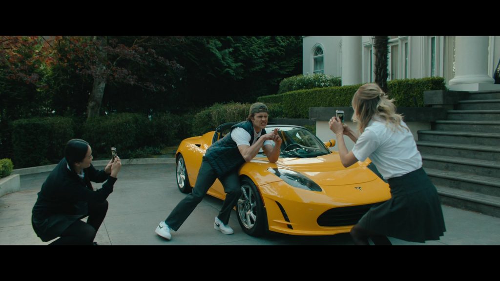 Tesla Car and Nike Sneakers in Bad Genius (2024) (Image 1)
