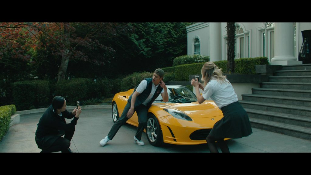 Tesla Car and Nike Sneakers in Bad Genius (2024) (Image 2)