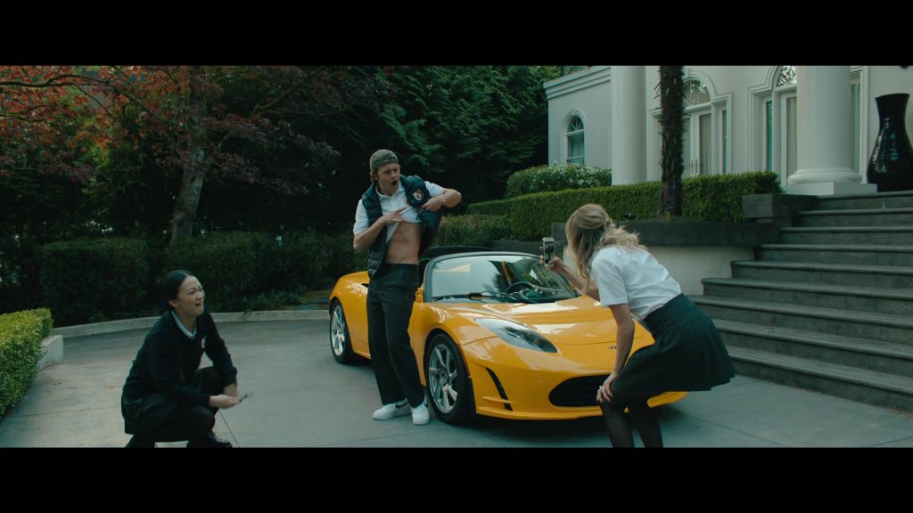 Tesla Car and Nike Sneakers in Bad Genius (2024) (Image 5)