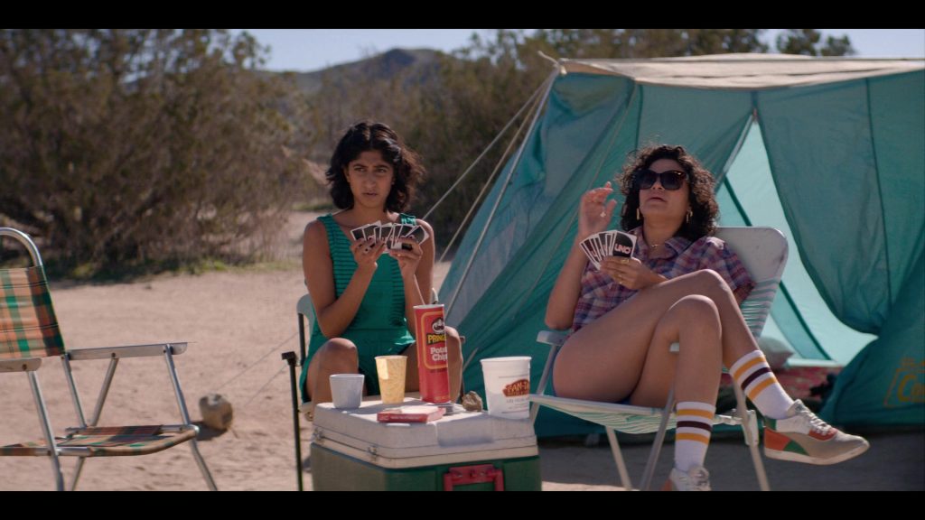 Travel Fox Sneakers And Pringles Chips in Glow – Season 3, Episode 6, “Outward Bound” (2019) (Image 1)