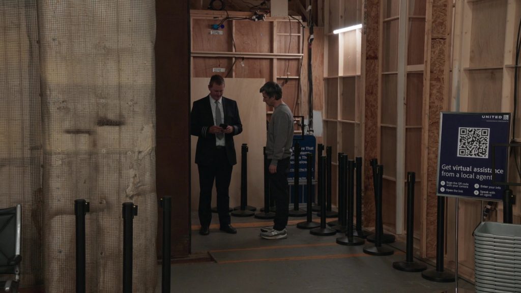 United Airlines, New Balance Sneakers in The Rehearsal S02E04 “Kissme” (2025) (Image 6)