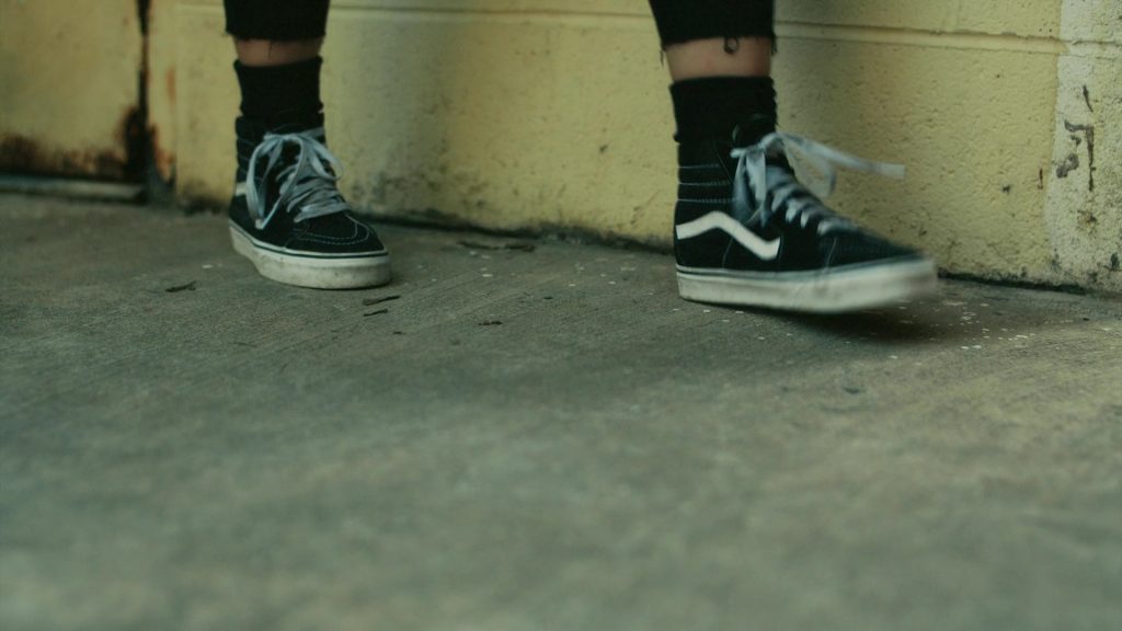 Vans Black HiTop Sneakers of Devery Jacobs as Elora Danan in Reservation Dogs S01E01 “Fckin' Rez Dogs” (2021) (Image 1)