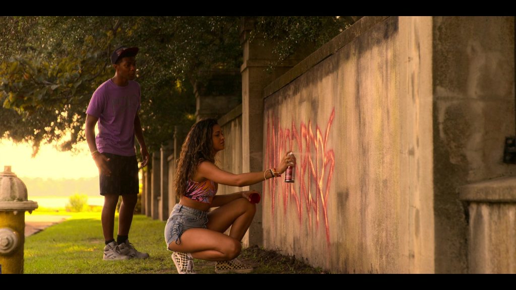 Vans Checkered Sneakers of Madison Bailey as Kiara ‘Kie' in Outer Banks S02E01 “The Gold” (2021) (Image 1)