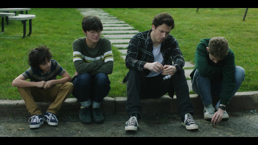 Vans, Converse and New Balance Shoes in The Institute S01E05 “Back Half” (2025) (Image 10)
