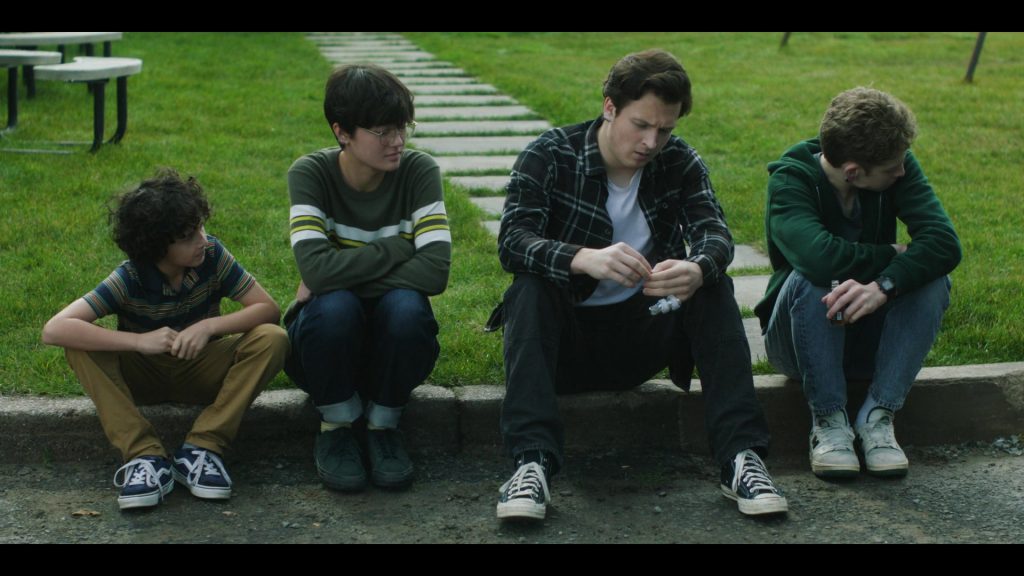 Vans, Converse and New Balance Shoes in The Institute S01E05 “Back Half” (2025) (Image 11)