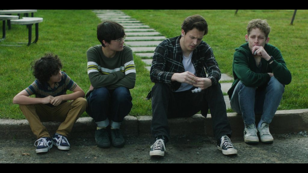 Vans, Converse and New Balance Shoes in The Institute S01E05 “Back Half” (2025) (Image 13)