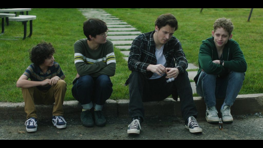 Vans, Converse and New Balance Shoes in The Institute S01E05 “Back Half” (2025) (Image 2)