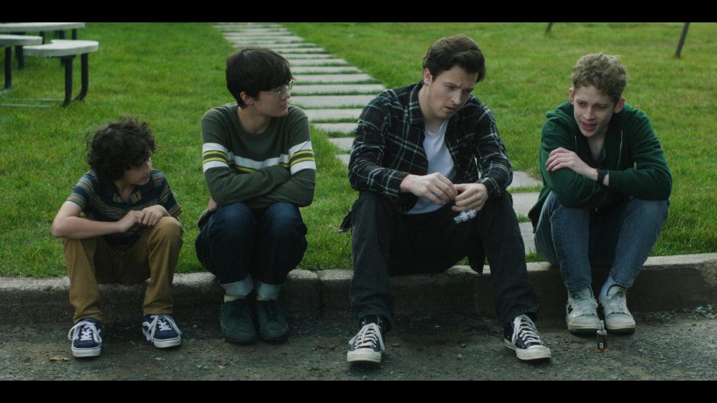 Vans, Converse and New Balance Shoes in The Institute S01E05 “Back Half” (2025) (Image 6)