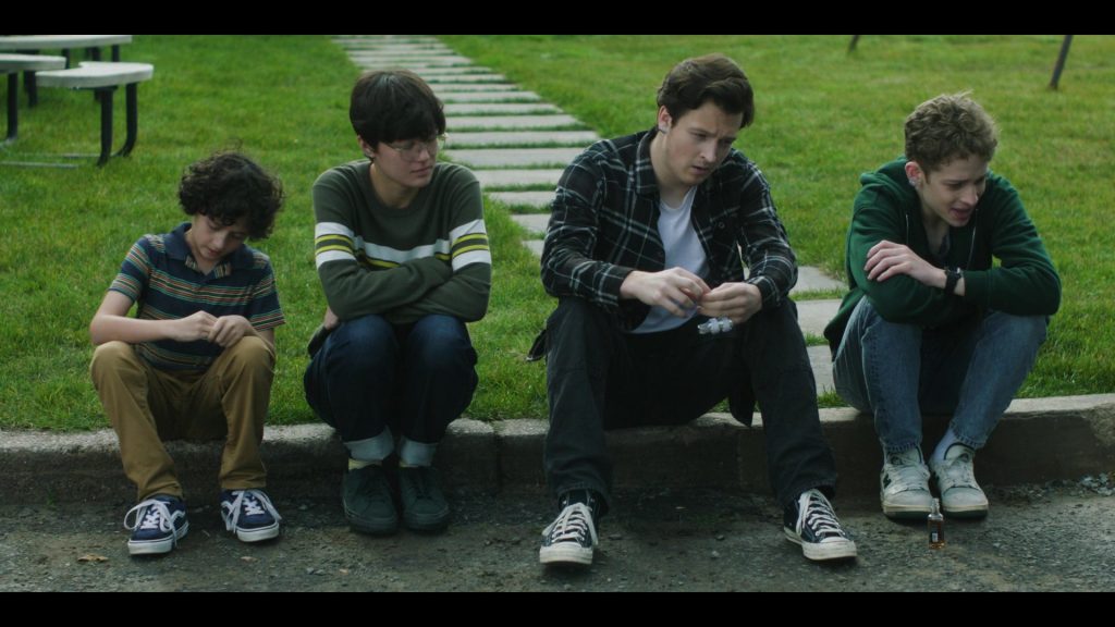 Vans, Converse and New Balance Shoes in The Institute S01E05 “Back Half” (2025) (Image 7)