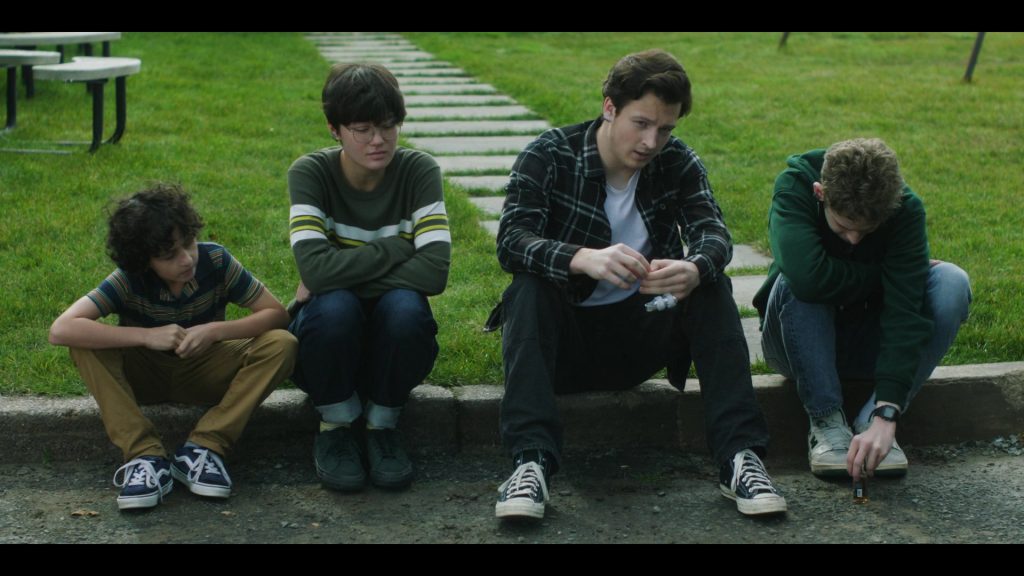 Vans, Converse and New Balance Shoes in The Institute S01E05 “Back Half” (2025) (Image 9)