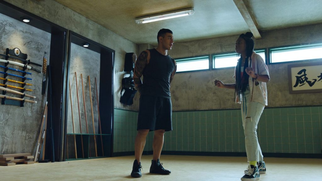 Vans HiTop Sneakers Worn by Kaci Walfall in Naomi S01E04 “Enigma” (2022) (Image 1)
